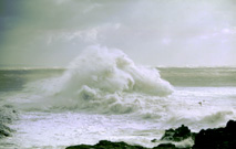 photo of huge wave crashing over wall at porthcawl in wales by photographer david anthony batten