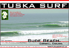 Photo of surf and surfing tubing wave at Bude Cornwall UK