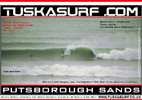 Photo of surf and surfing barrelling wave at putsborough sandsdevon england