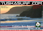 Photo of surf and surfing tubing wave at Caswell Bay Gower Wales UK