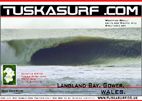 Photo of surf and surfing tubing wave at Langland Bay Gower Wales UK