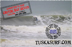 Photo of surf and surfing barrelling wave at croyde bay devon england
