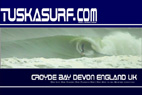Surf T shirt with Photo of surf and surfing barrelling wave at croyde bay devon england