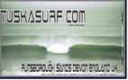 Photo of surf and surfing barrelling wave at putsborough sandsdevon england
