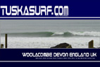 Surf T shirt with Photo of surf and surfing barrelling wave at woolacombe bay devon england