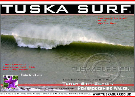 Photo of surf and surfing waves  in  Tenby Pembrokeshire Wales UK