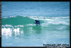 Tubing surf and surfing photos of waves 